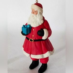 Santa's Busy Season Christmas Tree Ornament